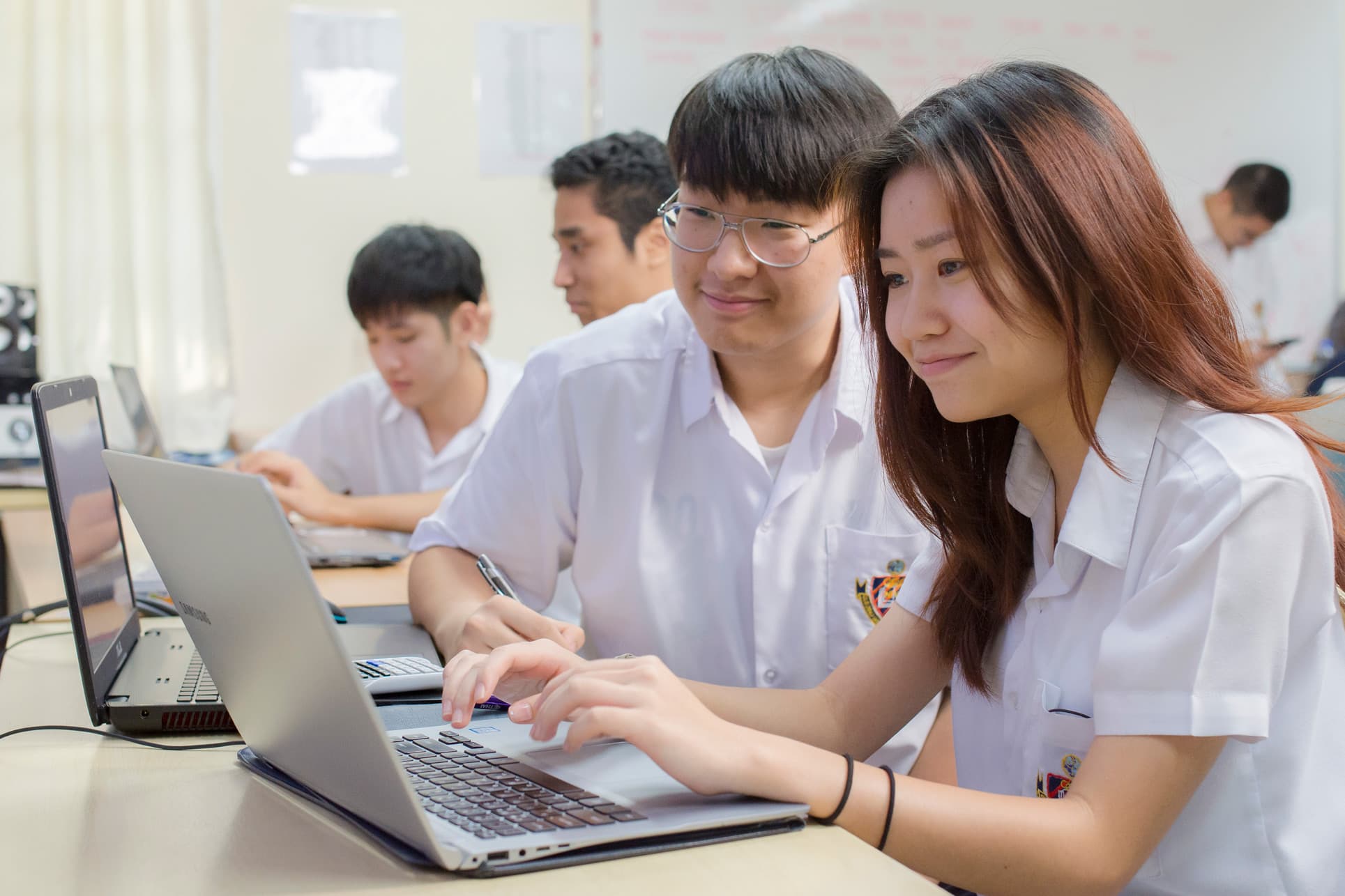 NIVA IT & Robotics - Secondary students using a laptop