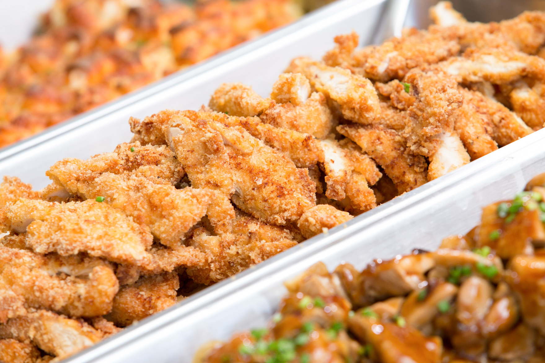 Tray of fried food at the canteen serving counter