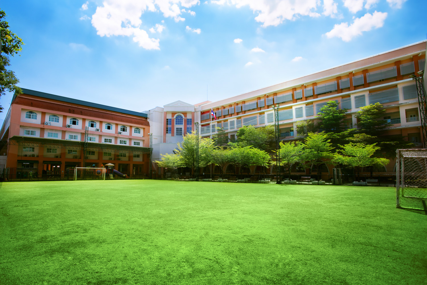 School buildings overlooking the green field