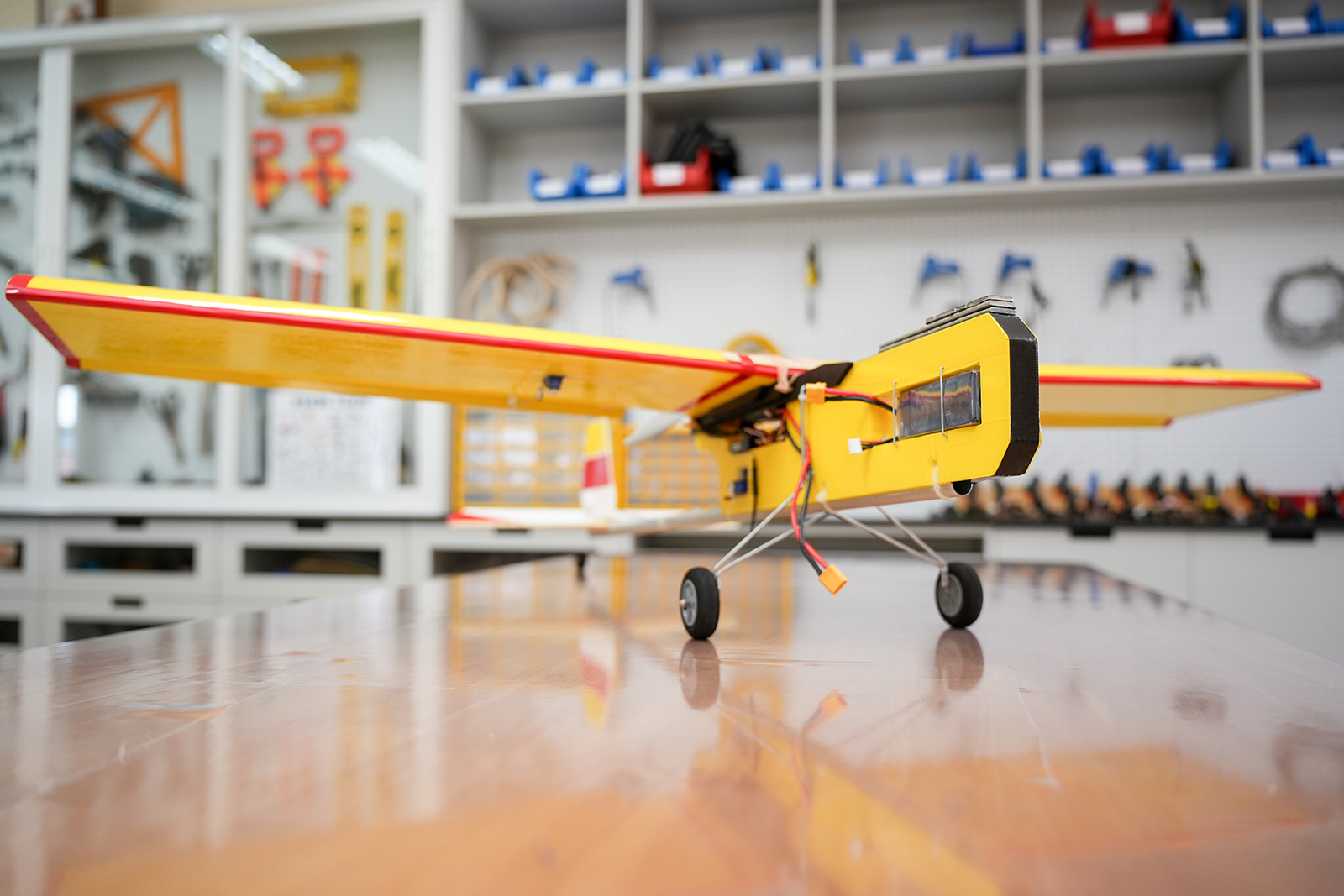 Model airplane on a STEM lab workbench
