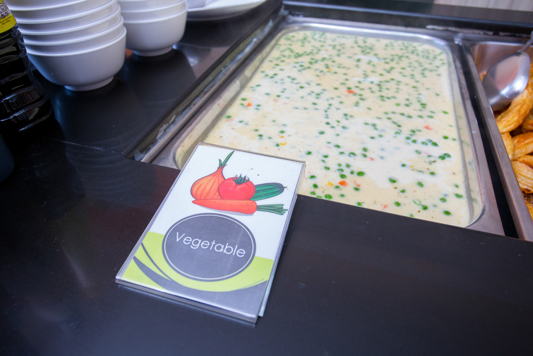 Vegetable soup at the canteen serving counter